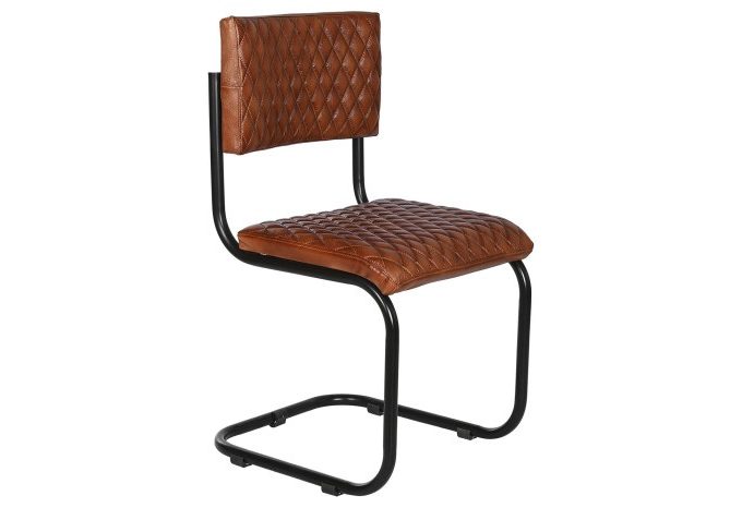 silla de piel marrón con rombos pespunteados de estilo retro