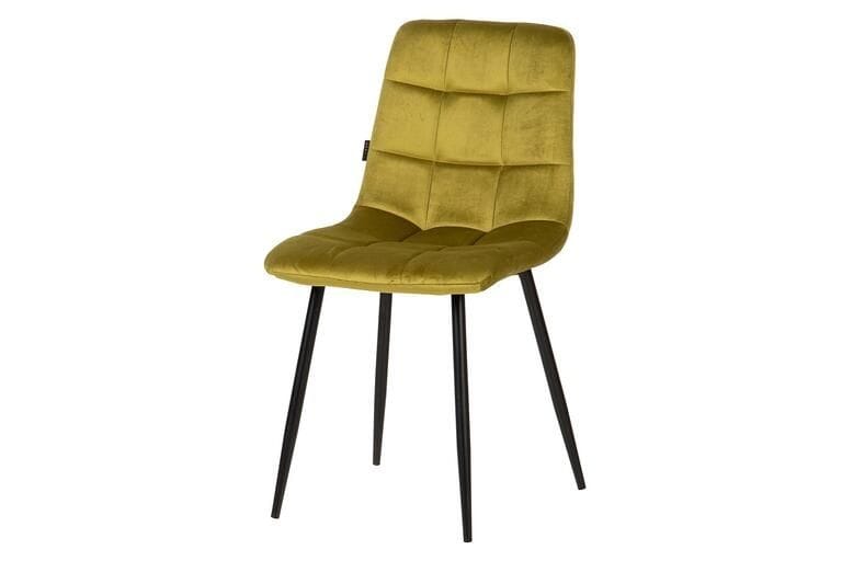 silla tapizada en terciopelo verde con las patas de metal negro de estilo vintage